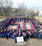 [포토]롯데 유통사 창립 50주년, 연탄으로 세상을 잇습니다!