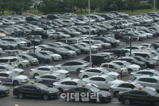 [포토]코로나19 신규 확진자 역대 최대, 김포공항 주차장 가득