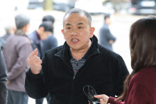 오세훈, 정치자금법 재판 앞두고 명태균과 법정 밖 설전