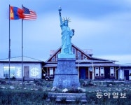[이명옥의 가슴속 글과 그림]짝퉁 자유의 여신상