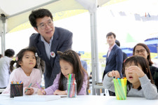 <區政 현장>장터·텃밭… 마을 공동체가 살아난다