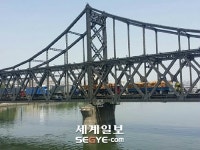 압록강철교 北 가는 물류차량 행렬… 개발 멈춘 황금평과 대조