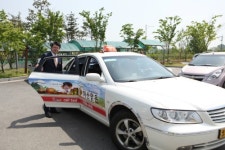 복기왕 충남 아산시장 택시 타고 선거운동