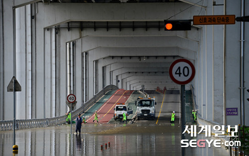 집중호우로 인한 서울 잠수교와 올림픽대로 통제, 팔당댐 방류량 증가로 혼란 발생