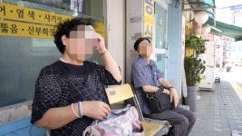 [밀착취재] 길었던 폭염…지친 행인들의 쉼터였던 착한 그늘