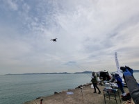 맞바람 안고도 노련한 캐스팅… 드론낚시대회 민어도 현장