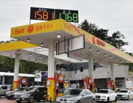 기름값 내림세… 휘발유 L당 1500원대 주유소도