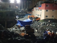 부산 산사태 33시간만에···노부부 이어 아들 주검으로 발견