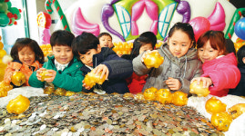  중랑구 꼬마 천사들이 전하는 ‘사랑의 돼지 저금통’ 