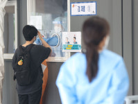 코로나19 신규 확진자 610명…이틀째 600명대