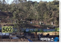 GS건설, 분양 전원주택 앞 묘지 병풍…삼송자이더빌리지 계약자 반발