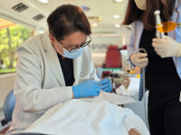 유디치과, 안양의 집 보육원서 유디 덴탈버스 나눔 진료