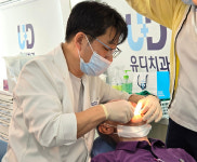유디치과, 전주보훈요양원서 의료봉사 진행