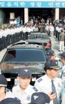 金회장 “경찰 수사서 밝혀질 것”…3.4평 조사실 신문과정 녹화