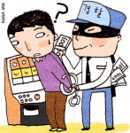 정복입고 “돈 내” 경찰관이 강도짓