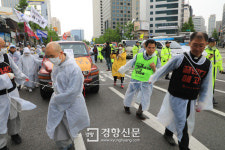 밧줄로 쌍용차 끌며 “출근하고 싶다”