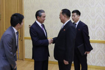 평양 간 왕이 ‘김정은 5차 방중’ 논의 주목