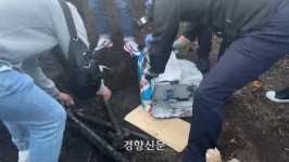 뜯겨 사라졌던 제주 단속 카메라는 왜 과수원 땅속서 발견됐나