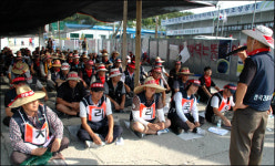 부산신항 덤프 노동자 파업 한달여만에 운송비 등 합의