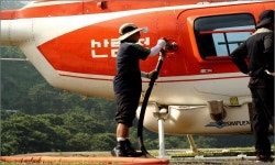 안개 낀 밤나무 밭에 헬기 뜨던 날