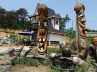 저게 어떻게 사자로 보여? 이구아나지