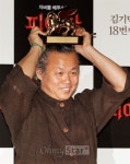 김기덕 감독 점유율 낮은 <도둑들>, 진짜 스크린 도둑