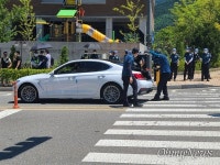 원주에서 언덕 넘어 집회 연 민주노총 조합원들, 왜?