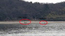 간조 때 섬 들어갔다 만조 되자 고립...해경 구조