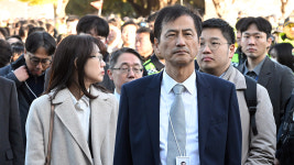 특검, 중앙선관위 등 압수수색...140억원대 장비 납품 비리