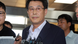 폭행 의혹 김광수 의원 경찰 출석…심려끼쳐 죄송