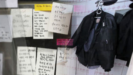 경비원 폭행 주민, 경찰 소환 조사…혐의 부인