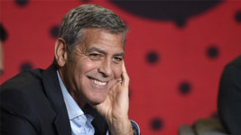 클루니 부부, 총기규제 평화행진에 50만불 기부