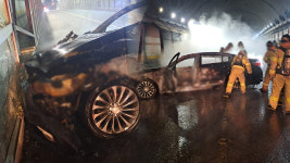 터널 입구에서 승용차에 불…운전자 다쳐