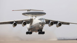 북, ‘하늘의 지휘소’ 공중조기경보통제기 공개…합참 “요격에 취약할 듯”