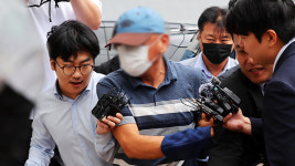 ‘장윤기 사건’ 수사팀장 구속 전 피의자 심문 출석