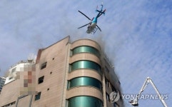 8층 대형 찜질방, 부산 광안 해수월드서 화재…헬기 이용해 구조