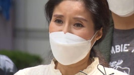 소주병 들고 경찰차 막아선 케어 박소연 징역 4년 구형
