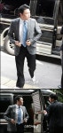 [포토]검찰 출두 전 양복 고쳐입는 싸이