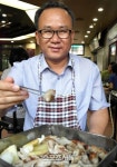 [고기박사 최계경의 육도락기행]몸과 마음을 채우는 곱창구이, 합정동원조황소곱창