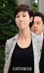 [SS포토]최태원 선고 앞두고 '입술 깨문' 노소영 관장