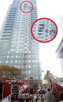 [SS포토] '헬기 충돌로 찢겨진 삼성동 아이파크'