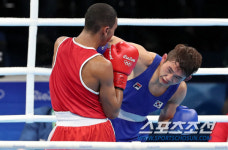 [리우포토] 복싱 함상명 강력한 오른손 훅