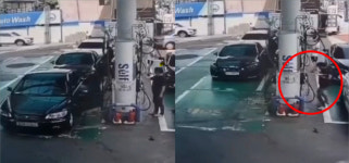 주유건 꽂은 채 운전한 女…머리에 맞았으면 정말 큰일 날 뻔했습니다.