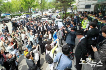 독립운동가 '폄하발언 논란' 속 광복회장, 연임 성공