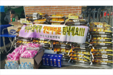 여수 수산시장을 측면 지원하는 사람들