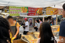 [르포]명동 만두 3개 4천원…바가지논란 후 가격표시제 무색