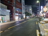 유럽 감성 유행 따라 설치한 광안리 돌길 결국 철거