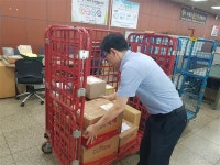 우편·영업·금융·보험·택배까지… 우체국 살림 책임지는 ‘슈퍼맨’