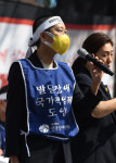 발달장애 동생 둔 장혜영, 삭발로 다진 ‘소명’ 대표 이미지