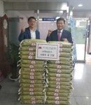 ㈜혁성운수, 재송1동 주민센터에 양곡 30포 기탁